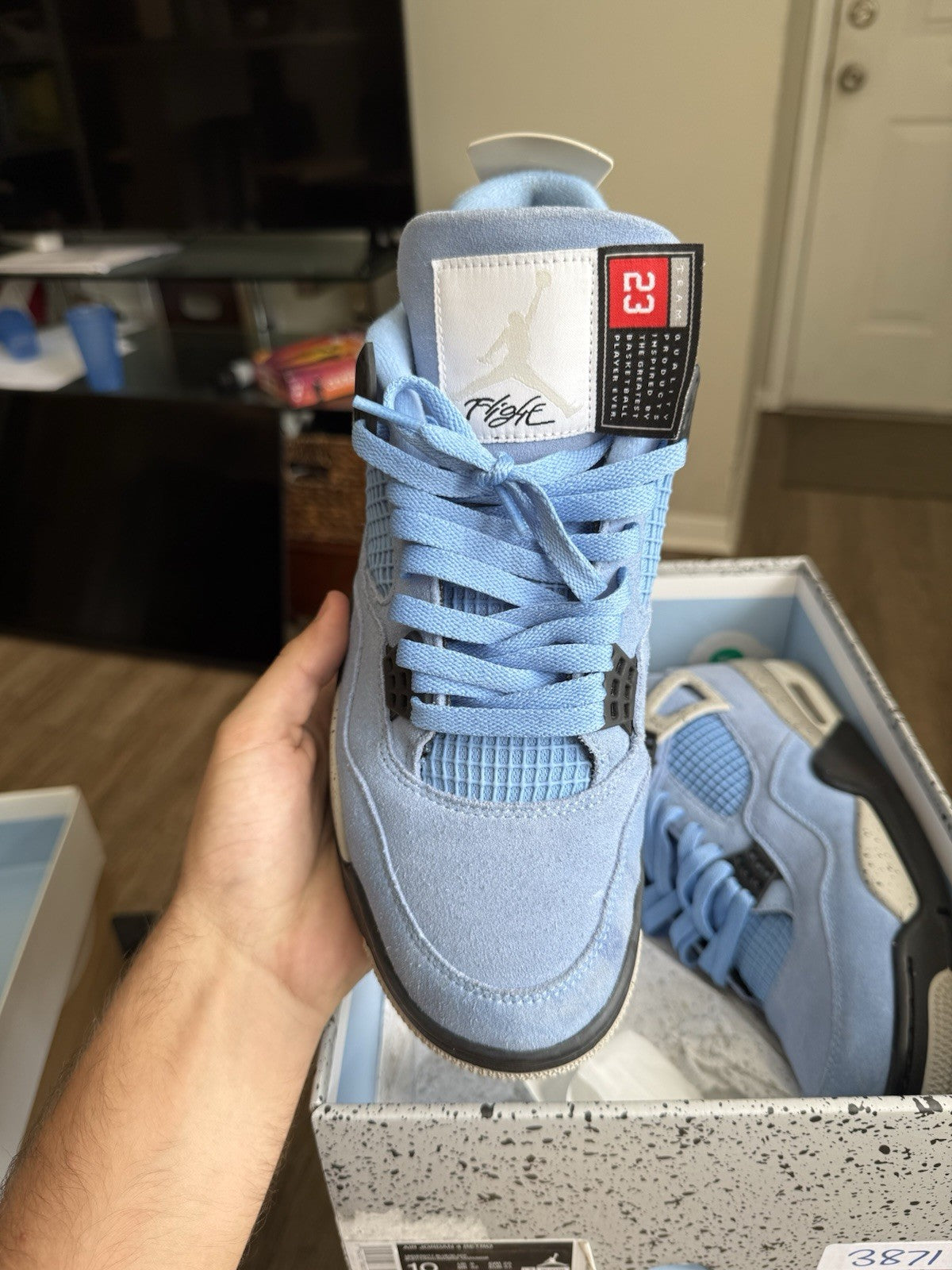 Size 10 - Jordan 4 Retro Mid University Blue